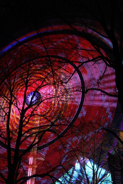 A wide shot of a Dreamcatcher concert in the US, showcasing the enthusiastic crowd and the band performing on stage. Capture the excitement and energy of the event, highlighting the connection between the band and their fans.