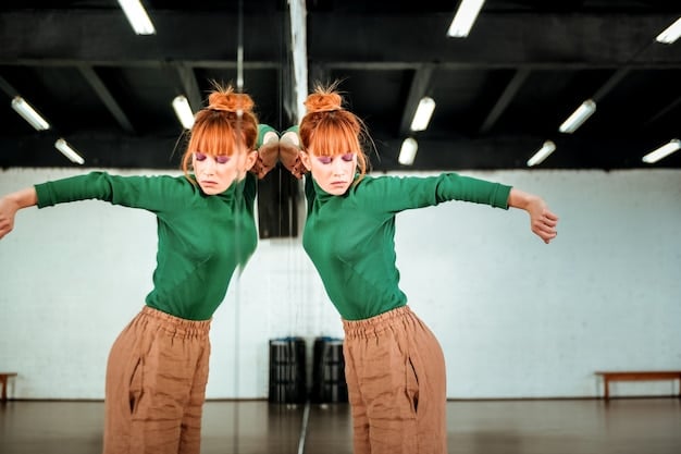 A close-up shot of two J-Pop idols practicing a specific dance move in a rehearsal studio. They are focused and determined, with visible sweat and effort, highlighting the hard work and dedication behind their polished performances.
