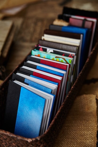 Close-up shot of several K-Pop albums neatly stacked. The albums are colorful and visually appealing, showcasing the different versions and packaging options available. Hands are reaching in to add more albums to the stack, symbolizing the collective effort of fans participating in group buying.