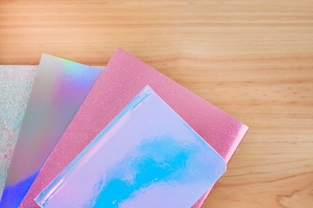 A close-up shot of a K-Pop album's inside packaging, showcasing the various inclusions like a photobook, random member photocard, stickers, and lyric sheet. The image should emphasize the appeal of collecting these items.