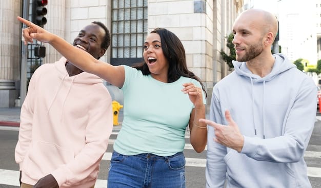 A group of racially diverse young adults in the US, enthusiastically participating in a flash mob dance performance to a popular K-Pop song in a public square, surrounded by onlookers filming with their smartphones.