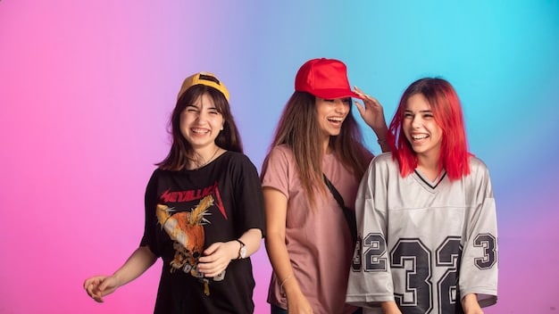 A group of J-Pop fans dressed in colorful, coordinated outfits featuring band merchandise and custom designs, posing for a photo before entering the concert venue. They are holding light sticks and smiling enthusiastically.