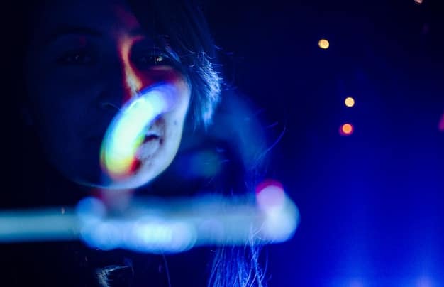 A close-up shot of a BTS member singing passionately on stage, bathed in dynamic stage lights, with blurred audience in the background, conveying intense emotion and artistic performance quality.